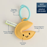 Itzy Ritzy Itzy Treat Fortune Cookie Teether for babies, soft silicone teething toy with a realistic cookie design