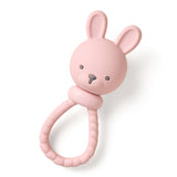 Itzy Ritzy Pink Bunny Sweetie Rattle for babies, featuring a soft pink plush bunny with a smiling face and textured ears.