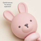 Pink Bunny Sweetie Rattle by Itzy Ritzy, soft plush toy with a cute bunny design and rattling sound for babies.