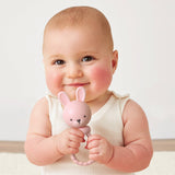 Pink Bunny Sweetie Rattle by Itzy Ritzy with soft plush fabric and a smiling bunny face, perfect for baby sensory play.