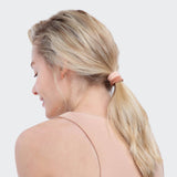 Set of 20 blush eco-friendly nylon elastics from KITSCH, showing small, soft pink hair ties on a white background.