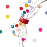 Rainbow dots big bow headband by Lilies & Roses NY, featuring a colorful large fabric bow on a flexible headband.