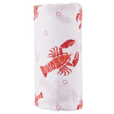 Unisex Heads or Tails swaddle blanket by Little Hometown featuring playful head and tail patterns for newborns and babies.