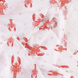 Unisex Heads or Tails swaddle blanket by Little Hometown featuring a playful animal print on soft fabric.