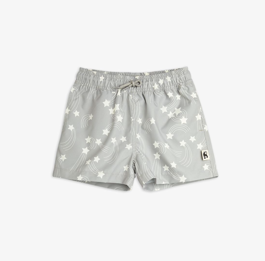 Mini Rodini Starfall swim shorts for toddlers, featuring colorful star patterns and lightweight, quick-drying fabric.