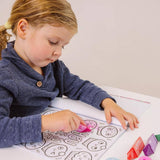 Color-in' Book: Happy Snacks coloring book by OOLY featuring vibrant snack illustrations for kids to color and enjoy.