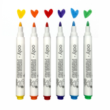 OOLY x Peanuts DIY Shrink Art Kit featuring Charlie Brown and Snoopy characters for creative shrink plastic art projects.