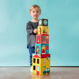 Colorful Peek-A-Boo House stacking blocks play set by Petit Collage with various shaped blocks and playful house design.