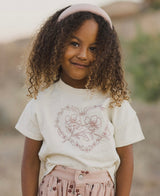 Rylee & Cru children's mini skirt with button front and blossom embroidery, showcasing charming floral details.