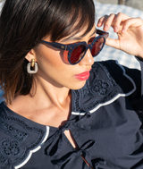 SARDINE Aster Check Mate patterned textile with intricate geometric design and vibrant colors.
