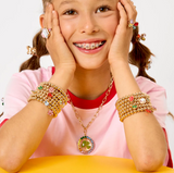 Super Smalls Super Stack Bracelet Set featuring colorful, layered bracelets with various bead and charm designs.
