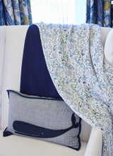 Colorful Coral Reef Shawl Blanket by Timo & Violet, showcasing vibrant, woven textile with intricate coral reef pattern.