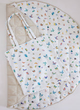 Colorful Madam Butterfly playmat and tote by Timo & Violet featuring butterfly and floral designs on soft fabric and spacious tote bag.