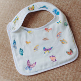 Timo & Violet Madame Butterfly baby bib in colorful multi pattern, soft fabric with butterfly design and adjustable neck closure.