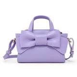 Purple Big Bow Baguette Handbag by Tiny Treats and ZOMI GEMS featuring a stylish bow design and compact shape.