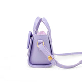 Purple Big Bow Baguette Handbag by Tiny Treats and ZOMI GEMS with a large bow detail and elegant design.