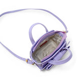 Purple Big Bow Baguette Handbag by Tiny Treats and ZOMI GEMS with a large bow and sleek baguette shape.