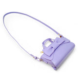 Purple Big Bow Baguette Handbag by Tiny Treats and ZOMI GEMS, featuring a large bow design and compact baguette shape.