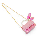 Purple shiny quilted fluffy bow handbag by Tiny Treats and ZOMI GEMS, featuring a stylish design and soft texture.