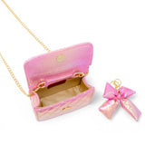 Purple shiny quilted fluffy bow handbag by Tiny Treats and ZOMI GEMS, featuring a stylish and soft design.