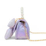 Purple shiny quilted fluffy bow handbag by Tiny Treats and ZOMI GEMS, featuring a soft, plush design with a stylish bow detail.