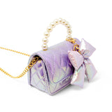 Purple shiny quilted fluffy bow handbag by Tiny Treats and ZOMI GEMS, featuring a soft quilted design and decorative bow accent.