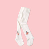 Fine knit baby girl tights with floral jacquard pattern from Viverano Organics, made with organic blend for comfort and style.